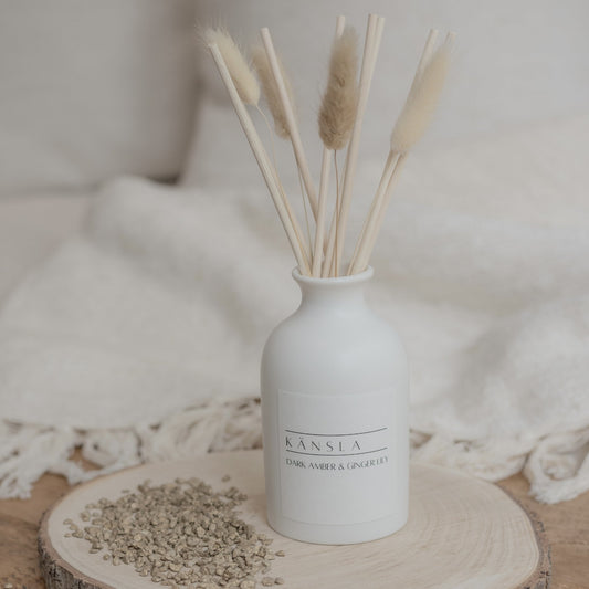 White ceramic reed diffuser with natural dried bunny tails and rattan reeds